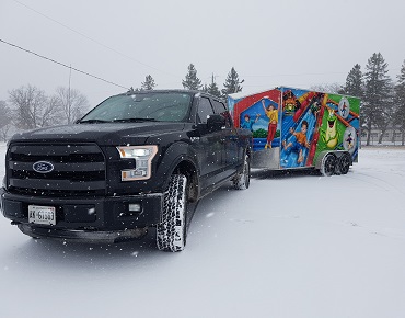 Truck Delivering Bouncy Castles